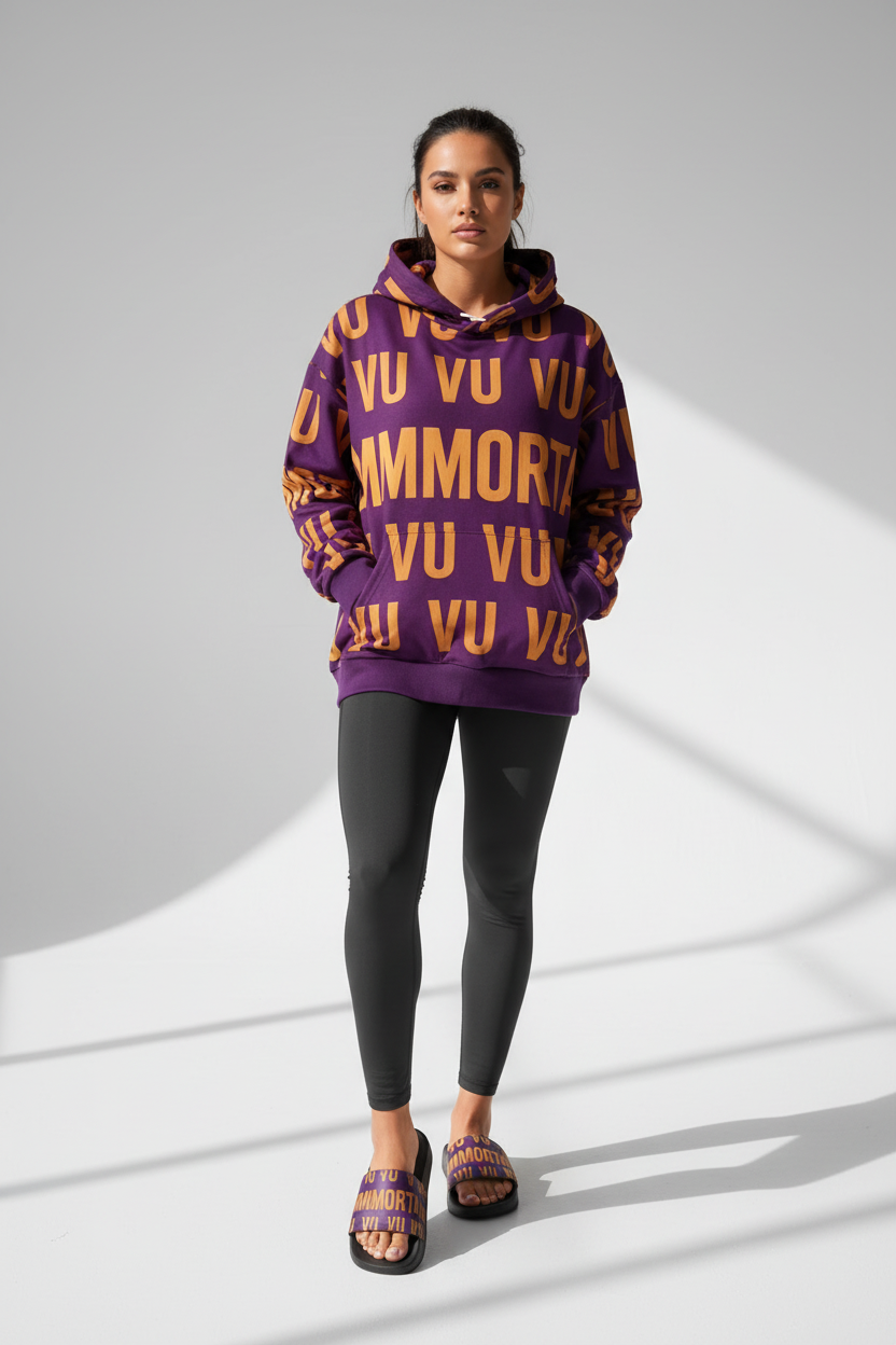 Female model wearing VU Immortal purple & gold hoodie and slides