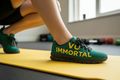 VU Immortal sneakers on yoga mat